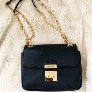 Black Michael Kors with gold chain bag